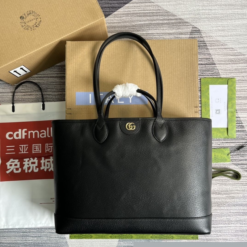 G*u*i shopping bags